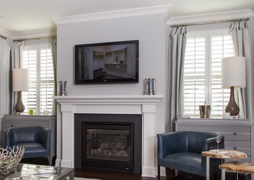 family room Bluff City faux wood shutters